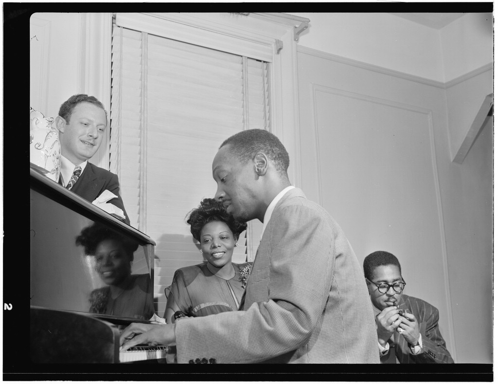 Mary Lou Williams in her apartment with Tadd Dameron and Dizzy Gillespie, 1947
